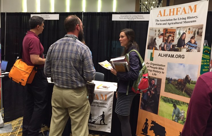 Jon Kuester, ALHFAM member and MOMCC board member, chats with visitors to the booth.